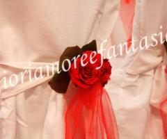 Spille di rose rosse per gli addobbi del ricevimento di nozze