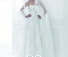 Abito da sposa con dettagli ricamati in pizzo