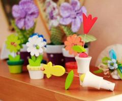 Tappi floreali in legno: un'idea per le bomboniere da Legnomagia