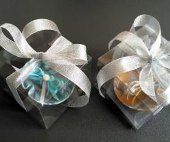 Confezionamento bomboniere design in cofanetti trasparenti