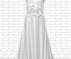 Abito da sposa a sirena dalla stoffa pregiata e dal corpetto oroginale