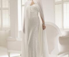 Daniela Cocco Haute Couture - Particolare abito da sposa con leggera mantella
