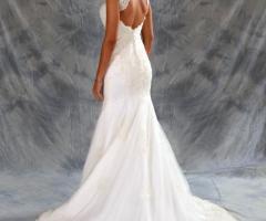 Abito da sposa a sirena con schiena aperta