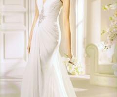 Splendido abito stile impero, dalla linea originale ed impreziosito da pregiati accessori