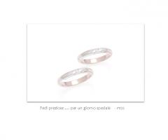 Ro.An. - Coppia fedi in oro bianco e rosa.