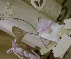 Bomboniere in ferro battuto e sacchetti porta confetti per le nozze