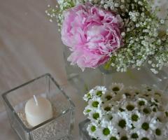 Centrotavola peonia e candele