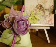 Bomboniera Linea Fate e sacchetto con rosa per i confetti di nozze