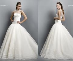 Abito da sposa con corpetto lungo sui fianchi