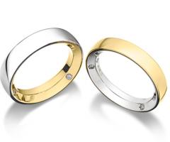 Fedi nuziali in oro giallo e bianco con brillantini all'interno - Collezione Fashion