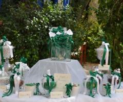 Il tavolo delle bomboniere in verde