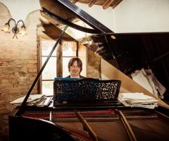 Sposo al piano Studio Photo's