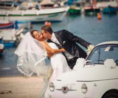 Foto degli sposi al mare