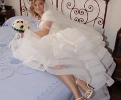 foto sposa sul letto