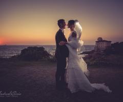 Andrea & Siria - Gli sposi a Castello Boccale al tramonto