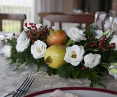Fiori e melograno per i tavoli di matrimonio