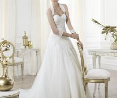 Abito con coprispalle