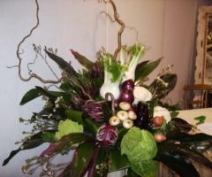Addobbo con verdure per il ricevimento di matrimonio