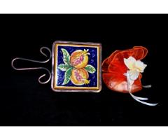 Poggia caffettiera in ceramica di Caltagirone.