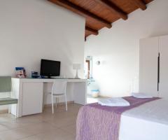 Camere da letto dell'Hotel Kalaonda di Siracusa