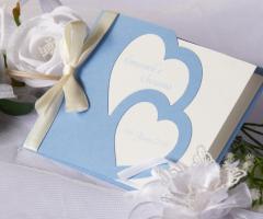 Partecipazioni Bijoux - Collezione Tenerezze cuori intagliati in versione azzurro serenity