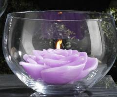 Candela in contenitore di vetro