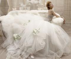 Abito con corpetto prezioso e fiocchi sulla gonna ampia - Collezione Romeo e Giulietta