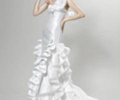 Vestito da sposa con ruches sulla gonna