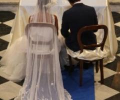 Foto degli sposi all'altare