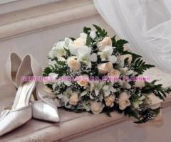 Bouquet e scarpe per la sposa