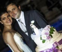 Ritratto sposi con torta nuziale