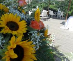 Allestimento floreale con girasoli per il matrimonio