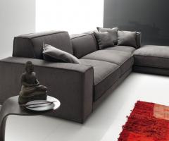 Divano grigio ad angololo