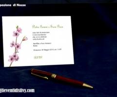 Partecipazione di matrimonio con motivi floreali