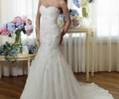 Abito da sposa dai preziosi accessori e ricami