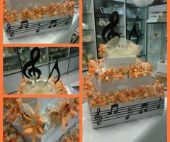 Torta tema musica arancio - Promessi Sposi Bomboniere