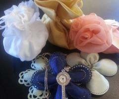 Bomboniere orologio e sacchetti porta confetti colorati