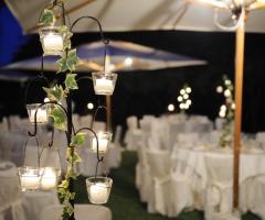 Allestimento con candele per il ricevimento serale