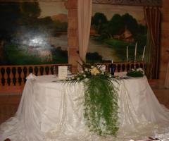 Ricevimenti Orchidea Malibuù - Il tavolo degli sposi nella sala ristorante