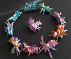 Astucci di confetti e bonbon personalizzati e coordinati a bomboniere design