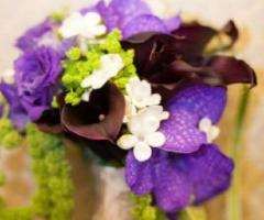 Bouquet sposa con orchidee vanda, calle stephanotise e amaranthus