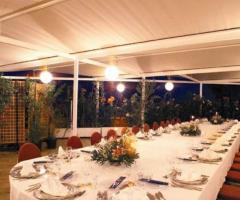 Lungo tavolo apparecchiato dello Splendid Hotel La Torre