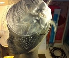 "Circe"con fiore e piuma