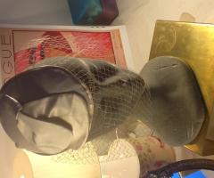 "Circe"con petali in seta e veletta a rete