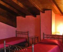 Camera da letto presso l'agriturismo per ricevimento di matrimonio Masseria Pezza del Medico