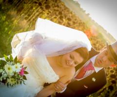 Sos Matrimonio - Campo di girasoli con gli sposi