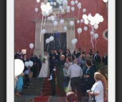 Lancio del riso di Alessandro Sorbello, fotografo matrimoni ad Aci Trezza (Catania)