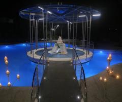 Villa Reale Ricevimenti - L'incantevole momento del torta presso L'oasi di Cupido