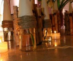 Vasetti di vetro con coni e spago creati dal Girafiore