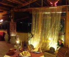 Agriturismo Savoca - Tavolo romantico nella sala interna